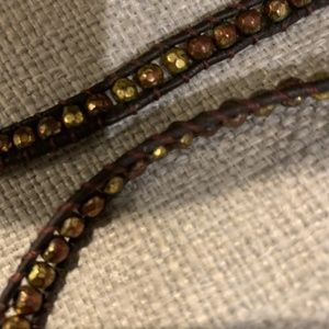 Chan Luu style bracelet brown leather with bronze rose gold beads.